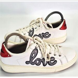 Skechers Women's White Sneakers with Red and Black Details